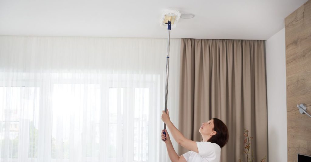 Cleaning the ceiling