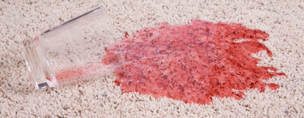 Red stain on carpet