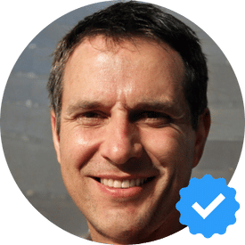 John B., a smiling 40-year-old man in West Vancouver, satisfied with the exceptional cleaning services provided by Hellamaid.