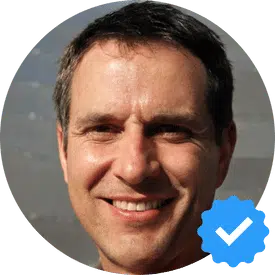 John B., a smiling 40-year-old man in West Vancouver, satisfied with the exceptional cleaning services provided by Hellamaid.