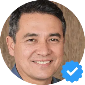 Portrait of John D., a 50-year-old male from Coquitlam, smiling.