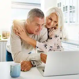 senior couple booking cleaning services online