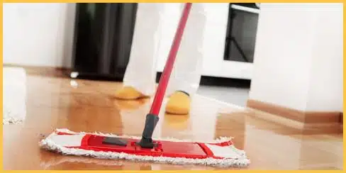A person mopping the floor.