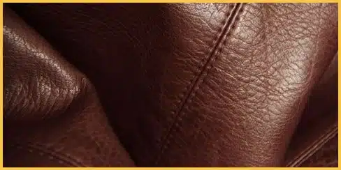 A brown leather surface close-up.