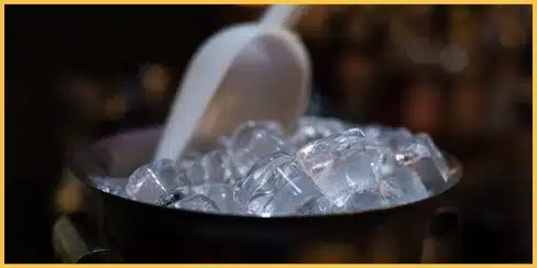 Bucket of ice cubes for removing gum from a couch.