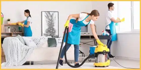 Professional cleaner in Mississauga cleaning a living room.