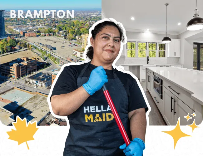 Hellamaid cleaner holding a mop and standing in a clean, bright kitchen, with Brampton’s city landscape behind