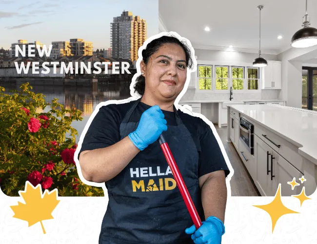 Hellamaid team member in New Westminster, holding a mop with a bright, contemporary kitchen and city backdrop