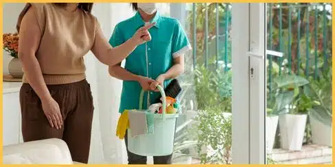 A hired professional cleaner being instructed what to clean.