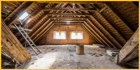A messy inside of a house attic.