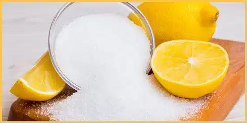 Citrus powder beside lemons.