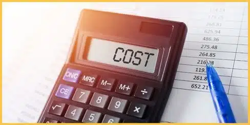 A calculator with "COST" on its screen.