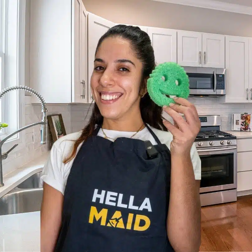 Hellamaid cleaner in uniform showing professional kitchen cleaning results