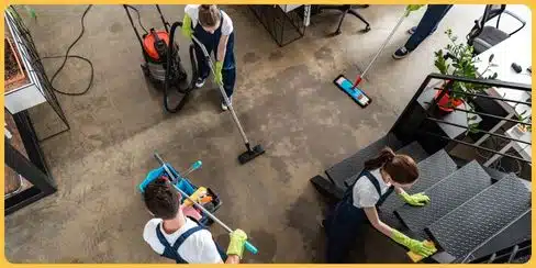 A cleaning team that's tidying a space.