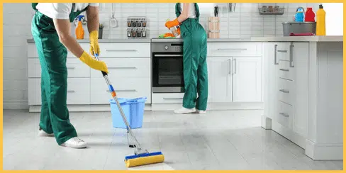 Hellamaid’s top-rated cleaner cleaning a kitchen.