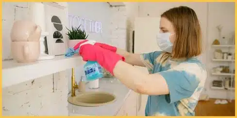 A lady cleaning her stuff.