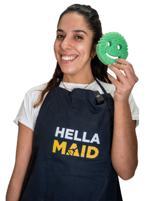 Hellamaid cleaner holding a sponge